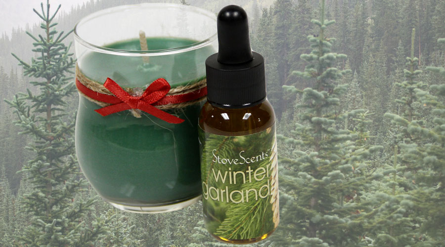 Condar winter Garland scent, candle, and evergreens in background because it smells like an evergreen forest.